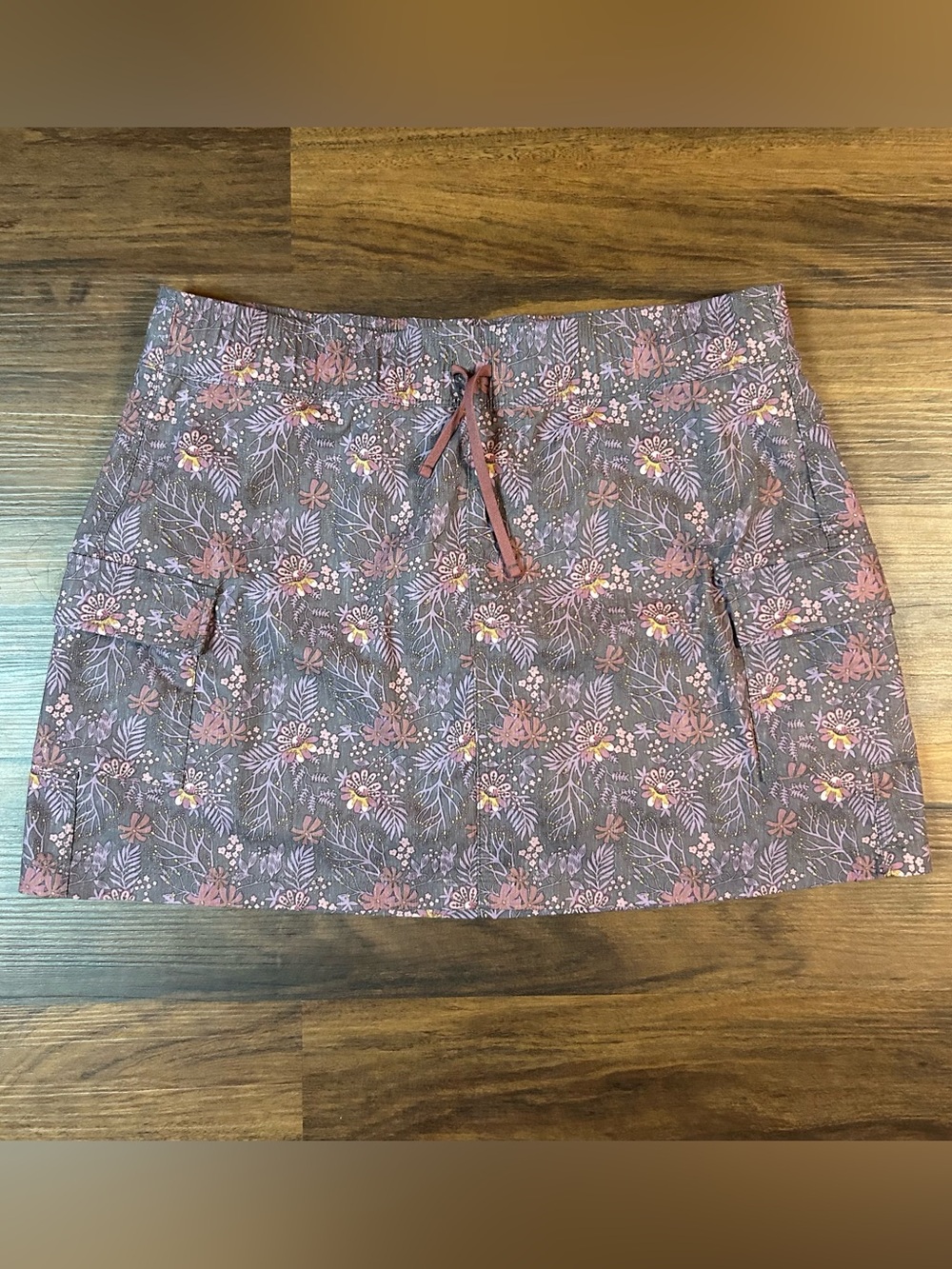 KüHL KRUISER GETAWAY SKORT in a floral purple. Size ~ S